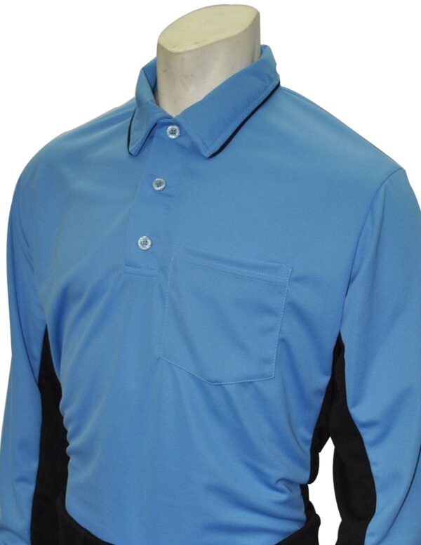 A close up of the chest pocket on a blue shirt
