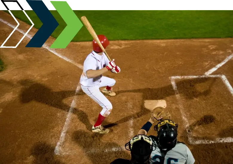 A baseball player swinging at the ball during a game.