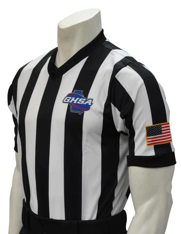 A referee shirt with the usa flag on it.
