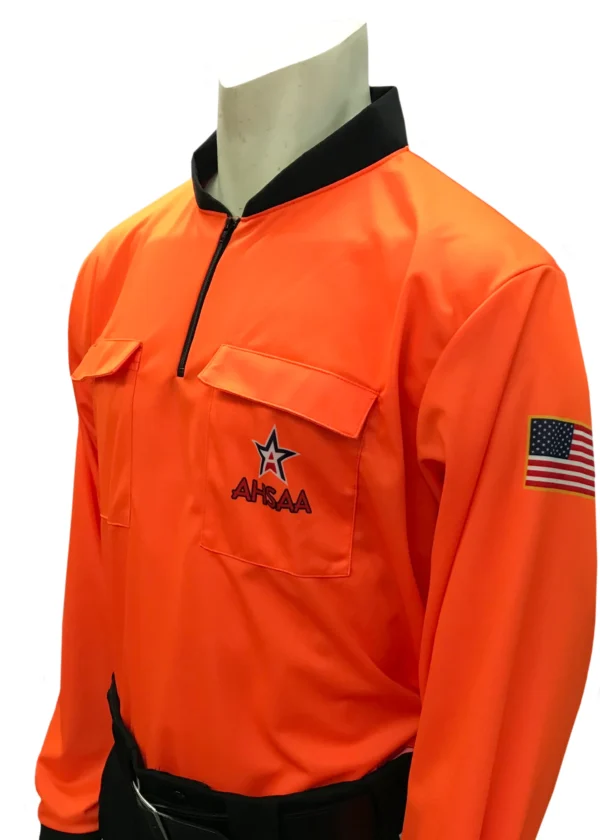An orange jacket with a black collar and a flag on the front.