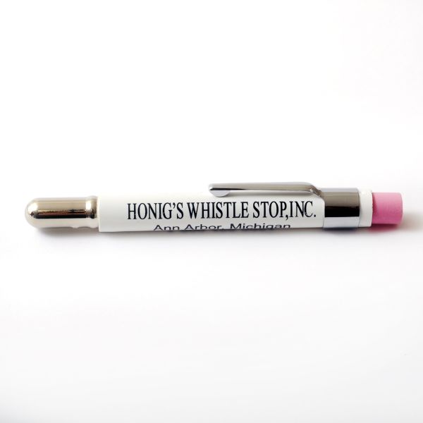 A pink pencil with the name " hongs whistle store inc ".