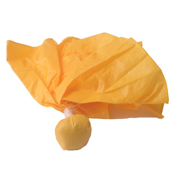 A yellow umbrella with a white ball on top of it.