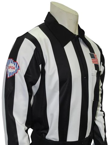 A referee shirt with the american flag on it.