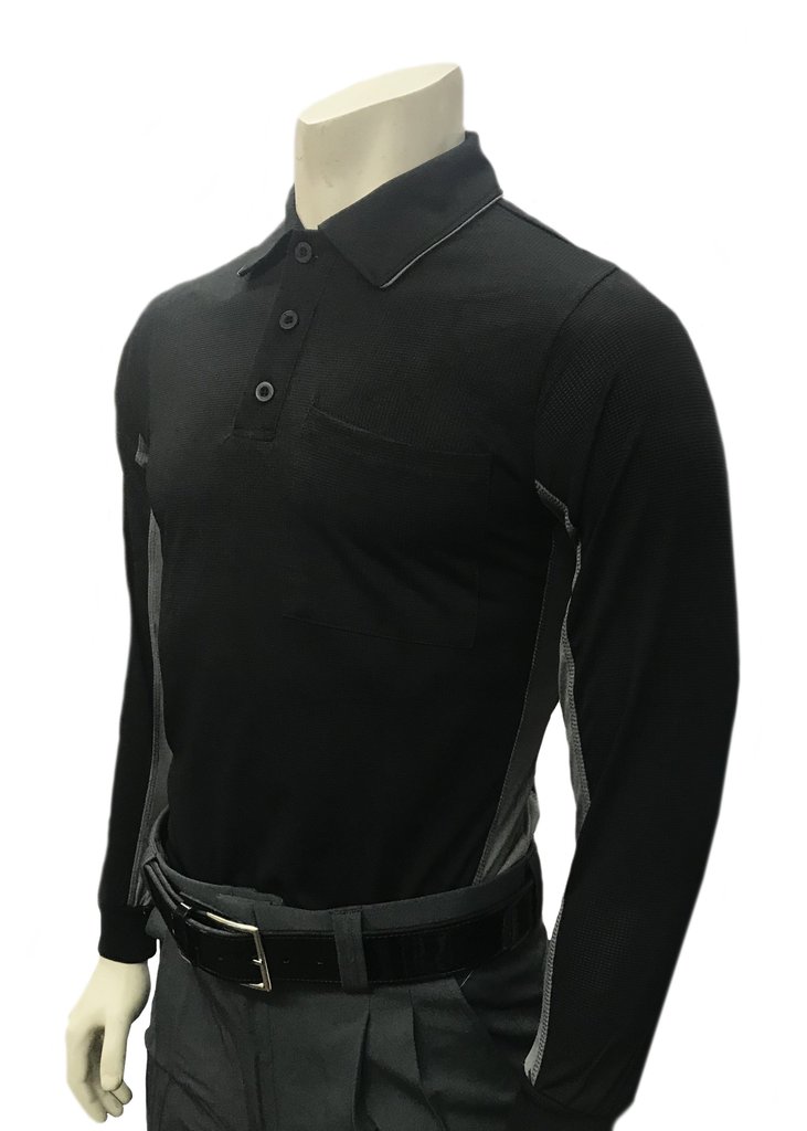 A man wearing a black shirt and belt.