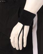 A white hand with black wrist strap on it's arm.