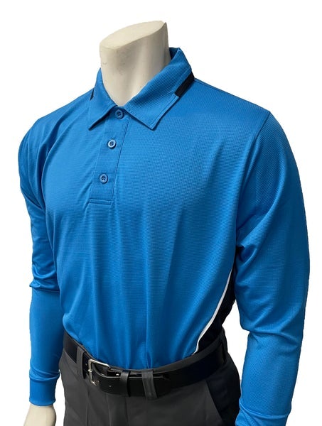 A referee shirt with long sleeves and black pants.