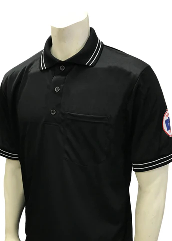 A referee shirt with the umpire 's name and number on it.