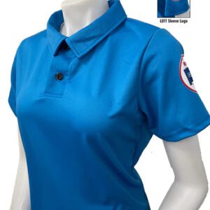 A woman wearing a blue shirt with a patch on the chest.