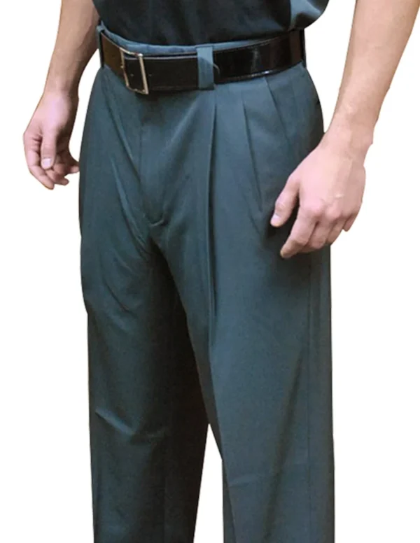 A man wearing a black belt and green pants.