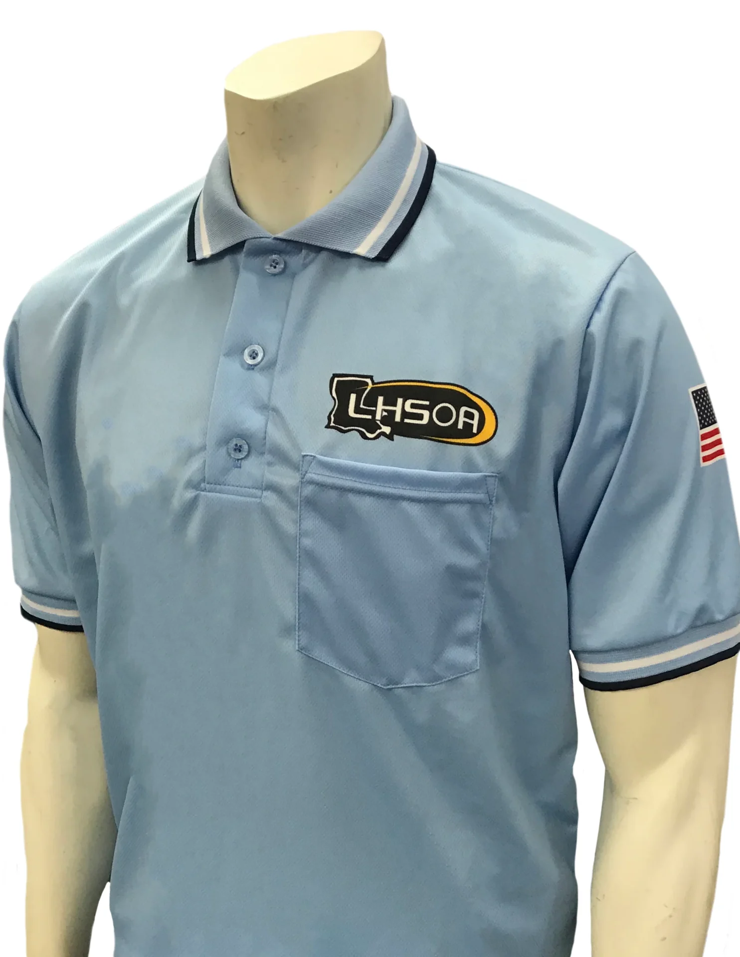 A light blue umpire shirt with an embroidered logo.