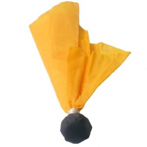 A yellow flag with a black ball on top of it.