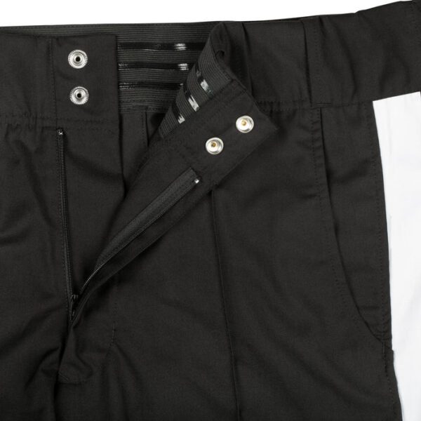 A black jacket with metal grommets and buttons.