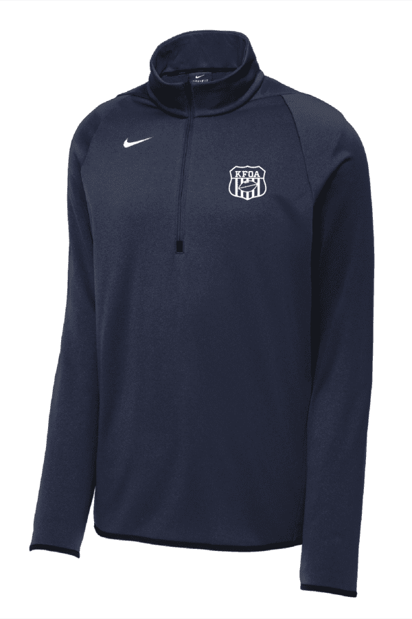 A navy nike long sleeve shirt with the team logo on it.