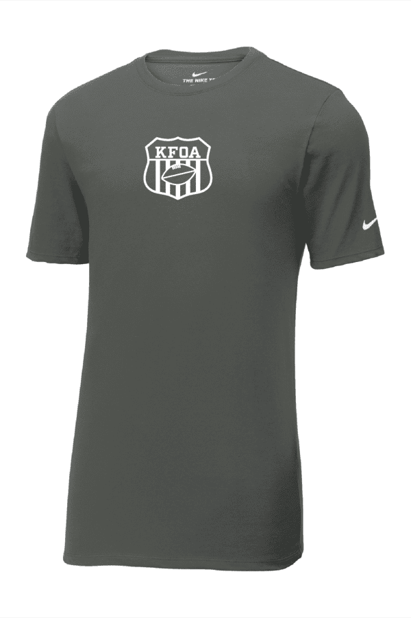 A gray nike shirt with the keda team logo on it.